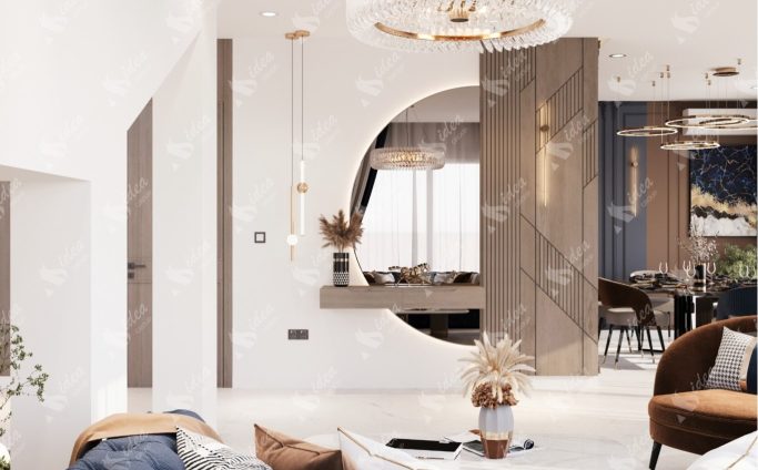 Luxury Interior Designs Modern living room with circular mirror, pendant lights, and stylish furniture.